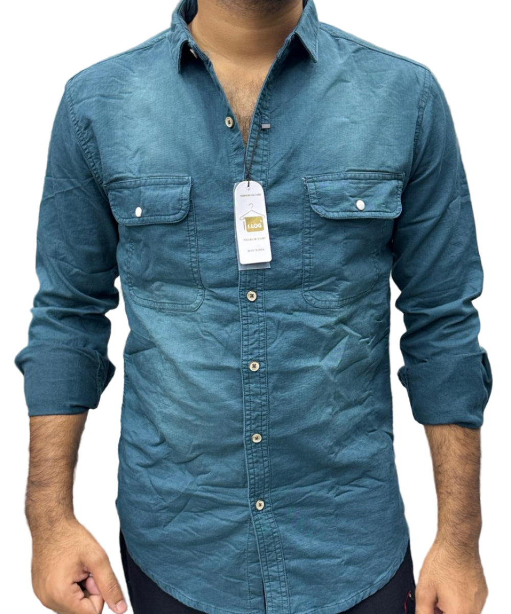 Blue shirt with a tag on a blurred background